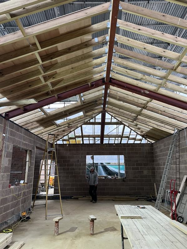 Timber roof structure and steelwork over new blockwork